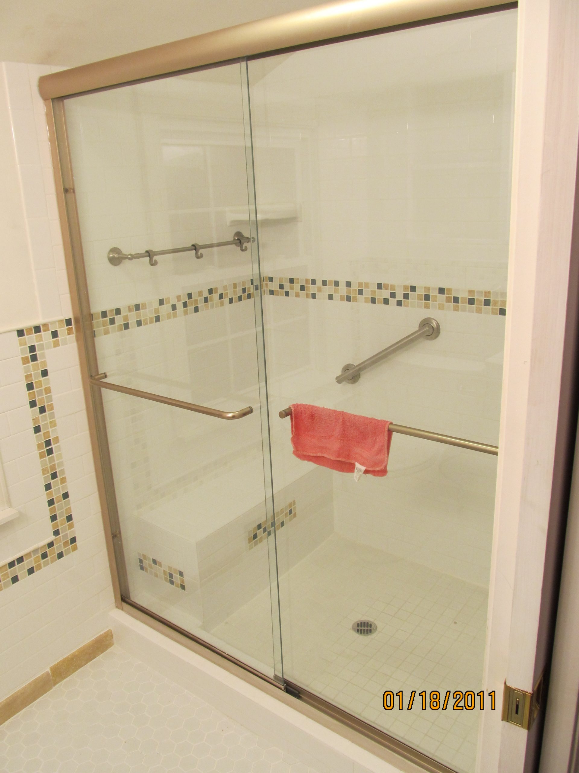 white shower with sliding glass door