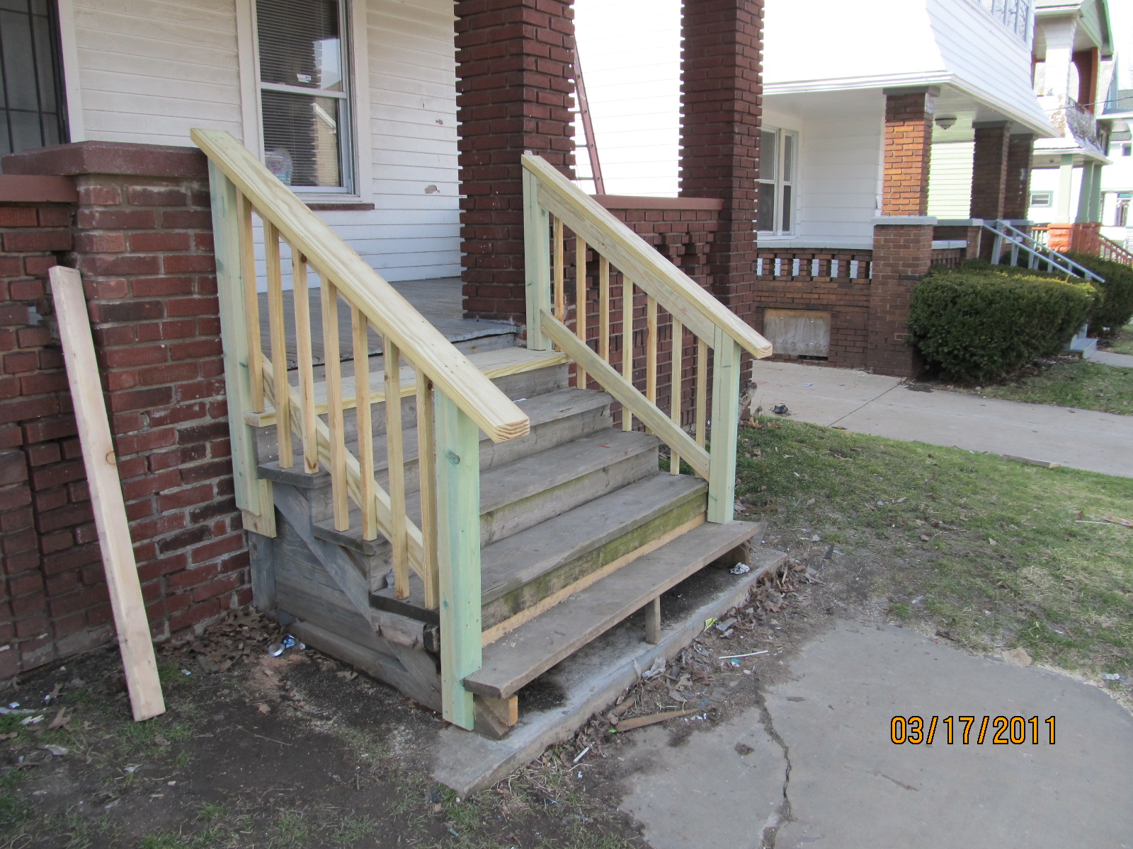 new wood railing outdoor steps