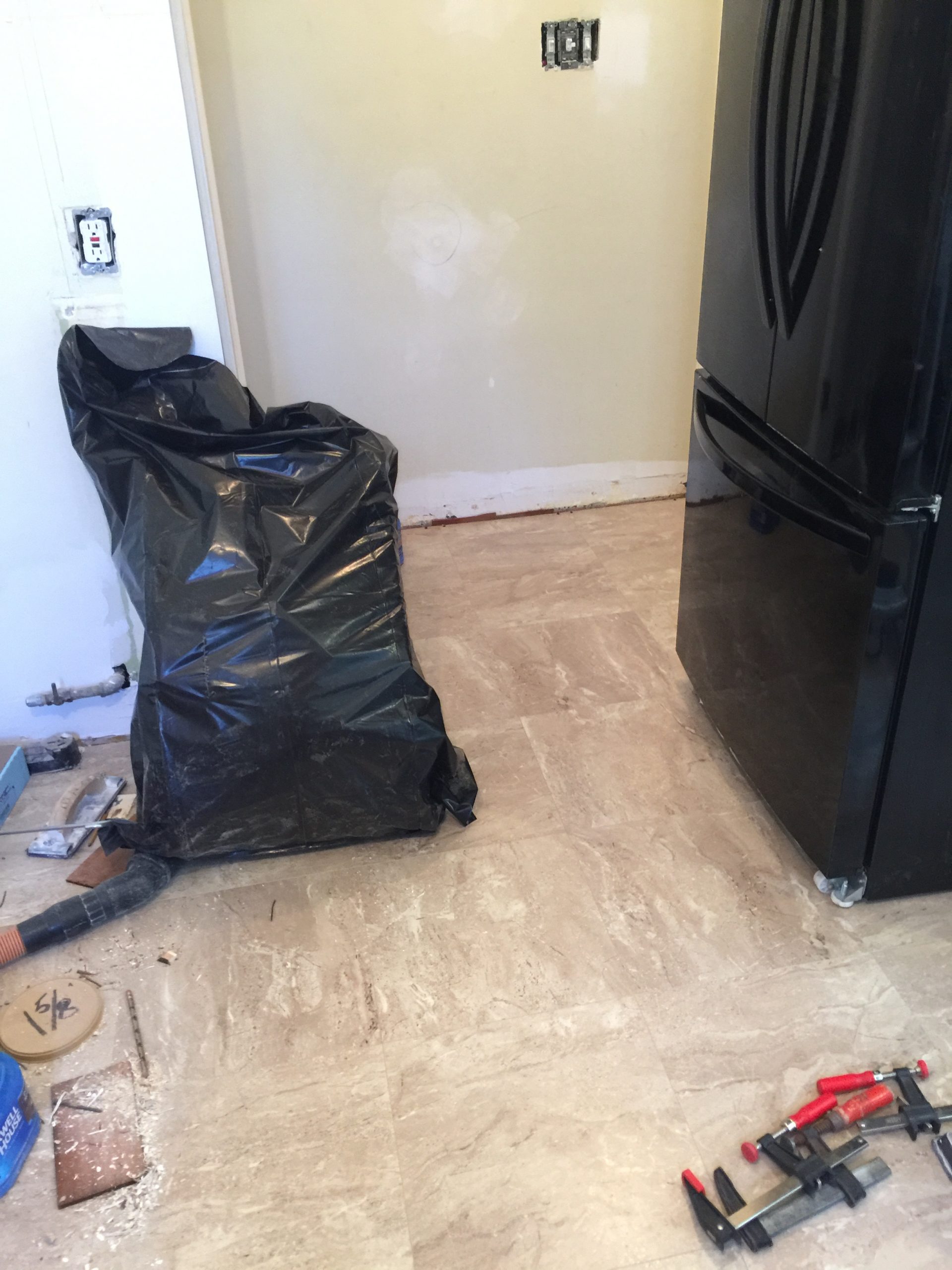 torn up kitchen floor for replacement